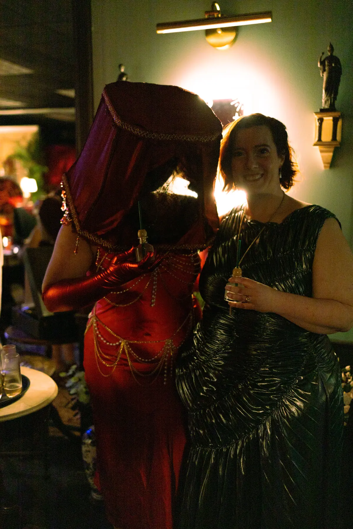 Friends gathering behind a veil in the installation