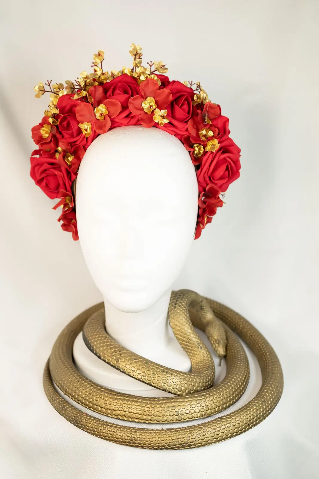 Red floral crown with gold details